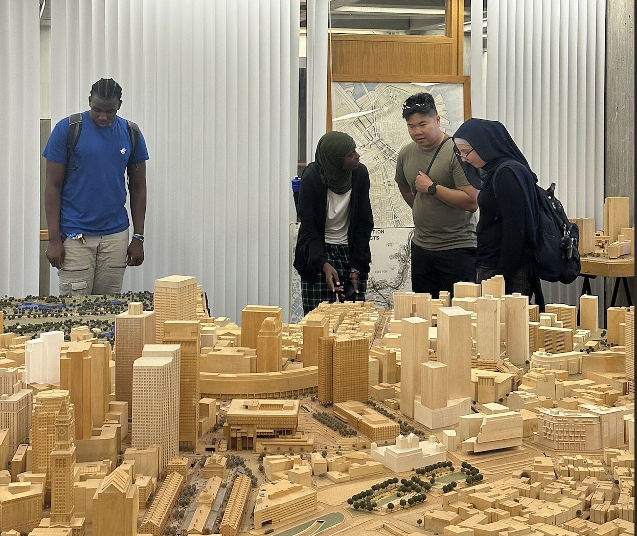 Students examining a city model