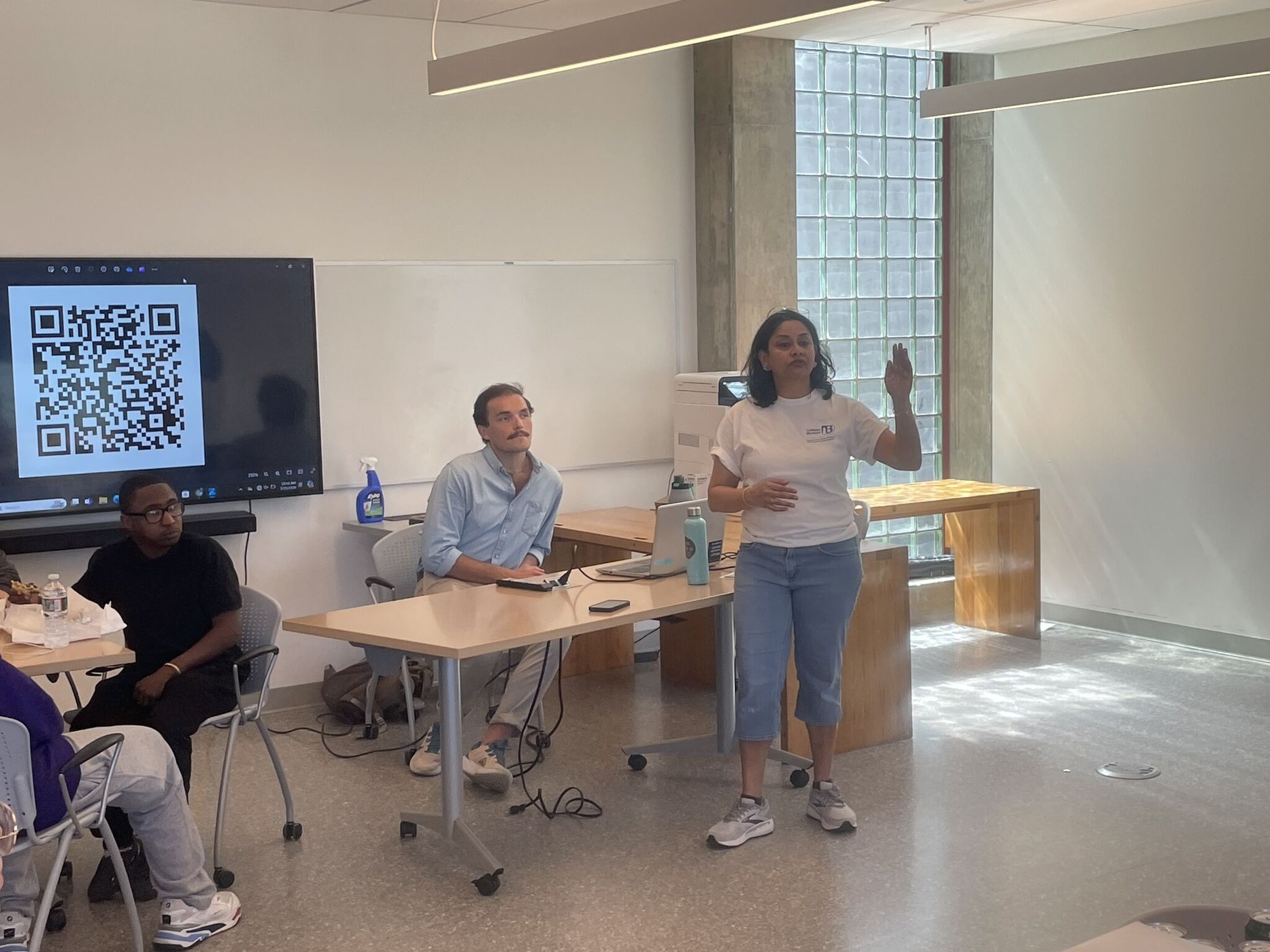 Dr. Sowmya Balachandran leading a high school classroom session