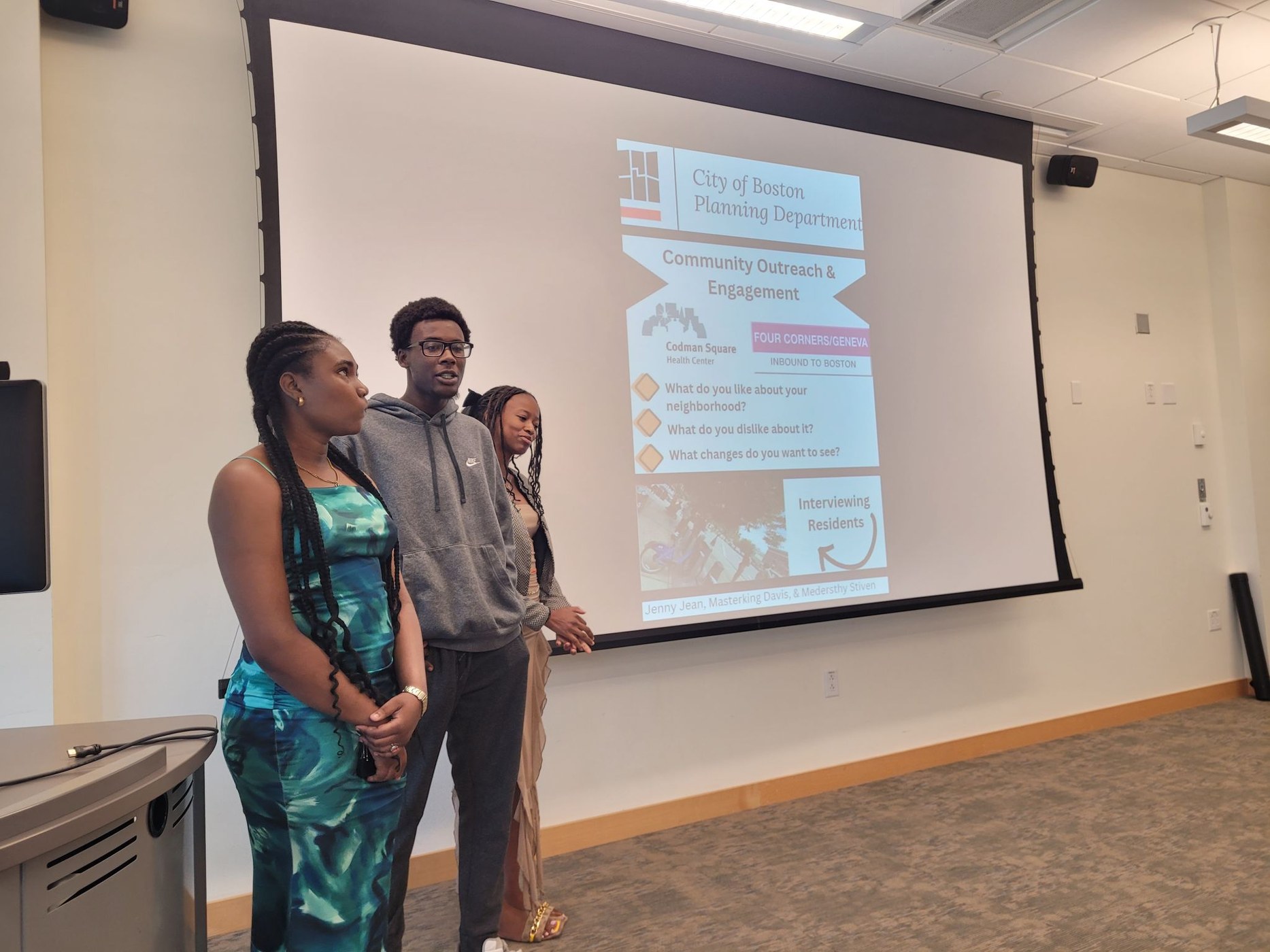 Students presenting community outreach work