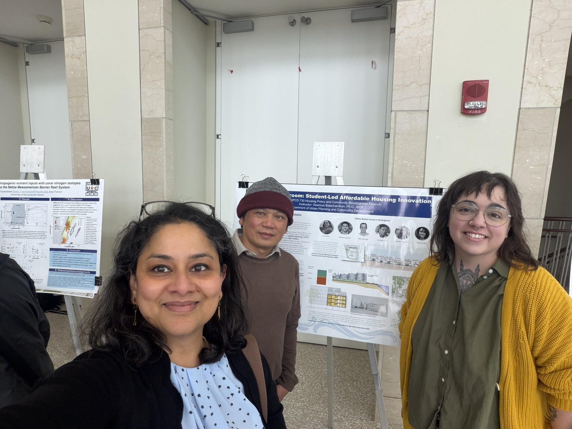 Students standing in front of research posters